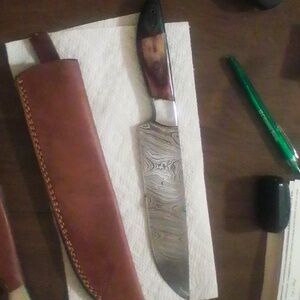 Handcrafted Damascus Steel Knife with Brown Sheath
